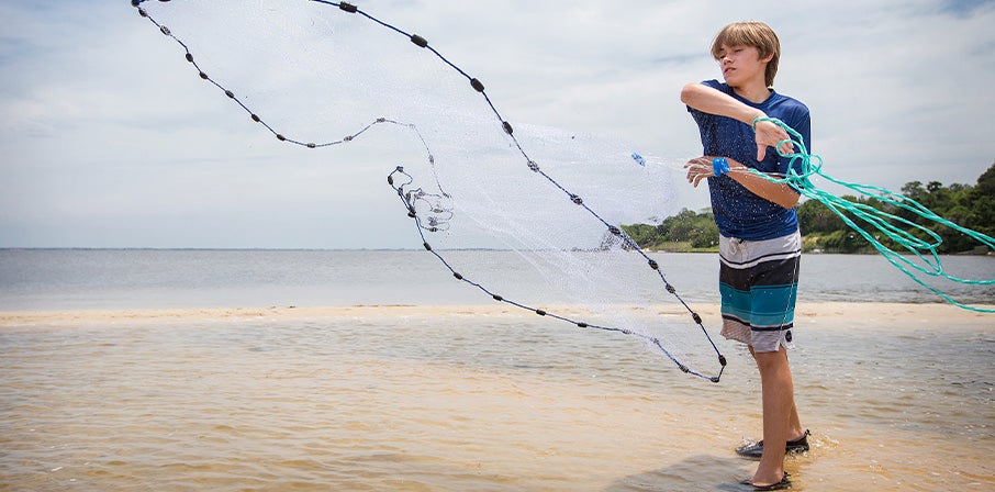 Camper throws fish net at Outer Banks Campus